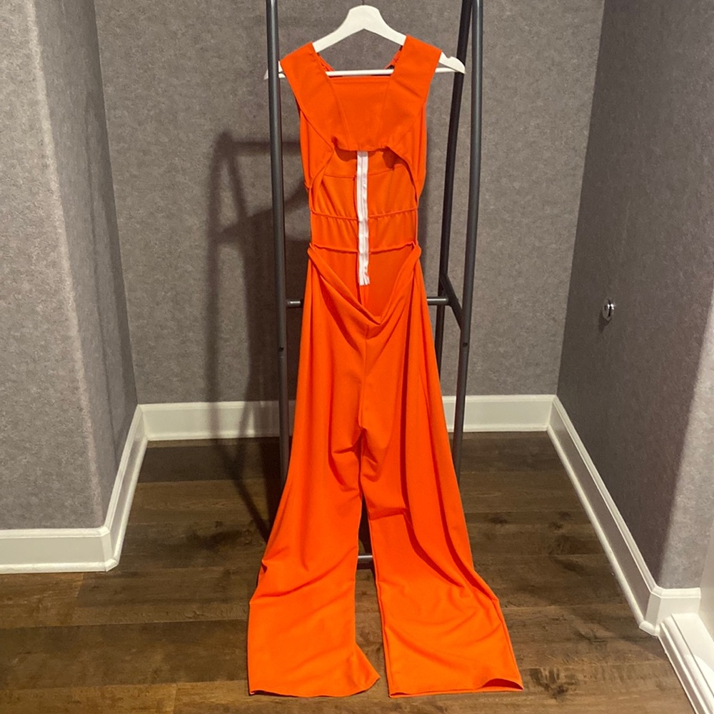 Orange jumpsuit, midriff. Size medium. PrettyLittleThing